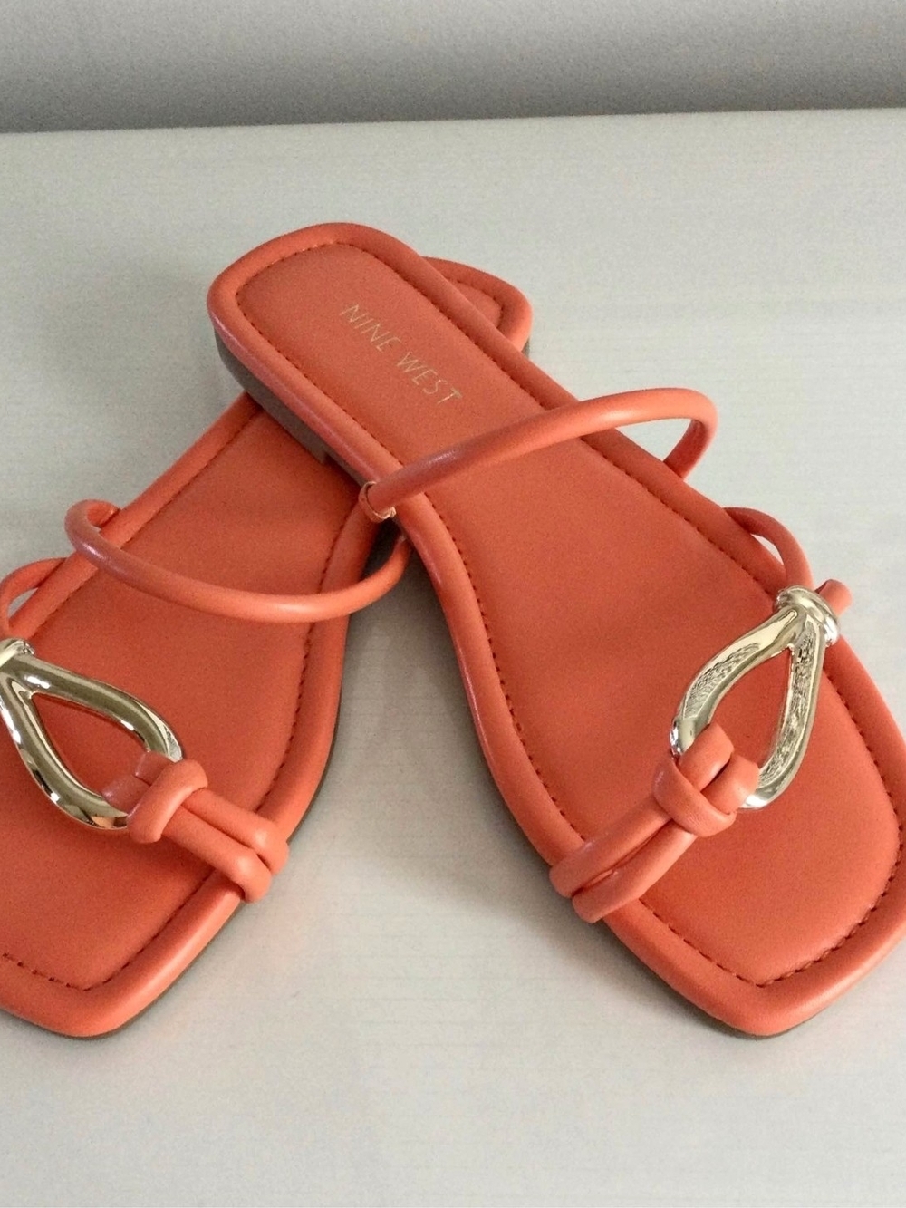 Nine West Coral Orange Slide Sandals with Gold Accent